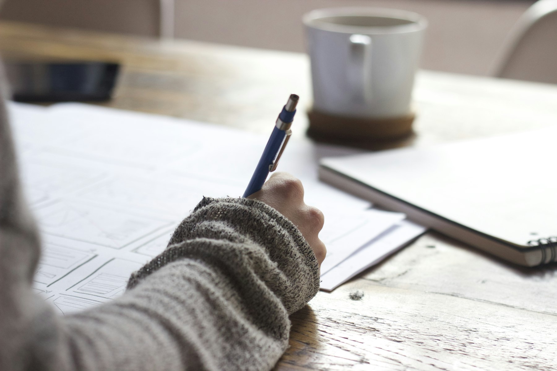 Planning notes on a desk.